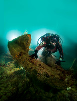 Diver near large anchor