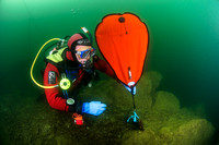 Diver deploying lift bag
