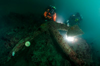 Divers near large anchor