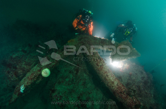 Divers near large anchor